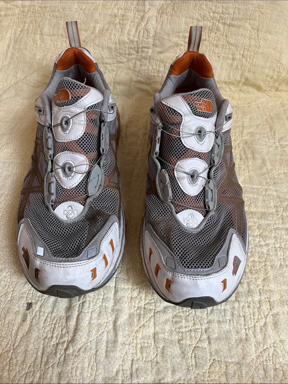 The North Face Men’s Gray and Brown Trail Runners with Orange Accents